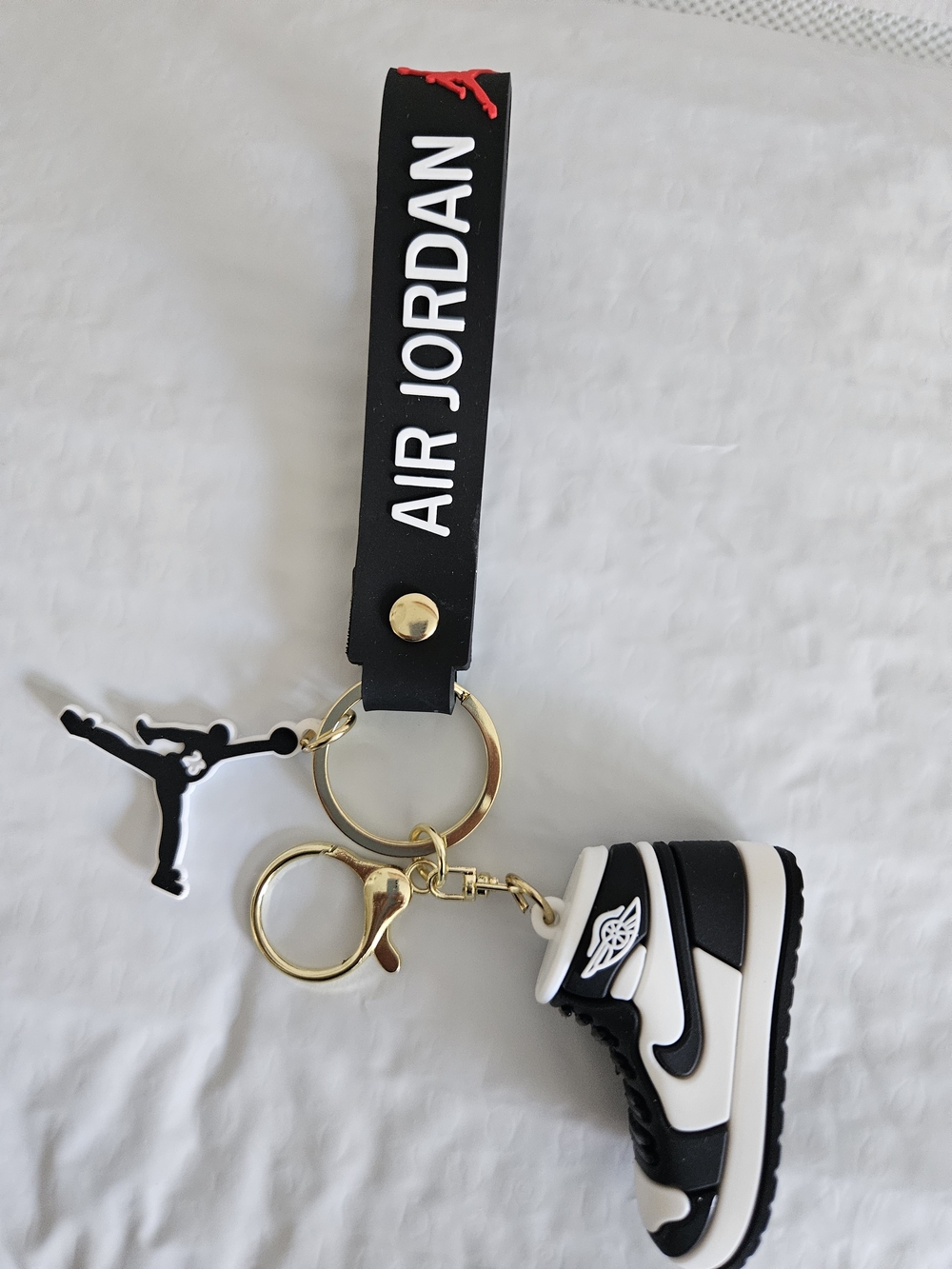Jordan Black & White Mini Sneaker Keychain with Gold Hardware